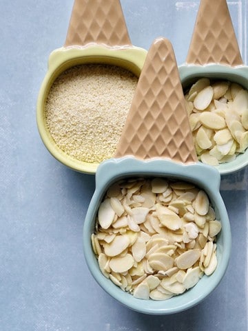 measuring cups filled with almond flour