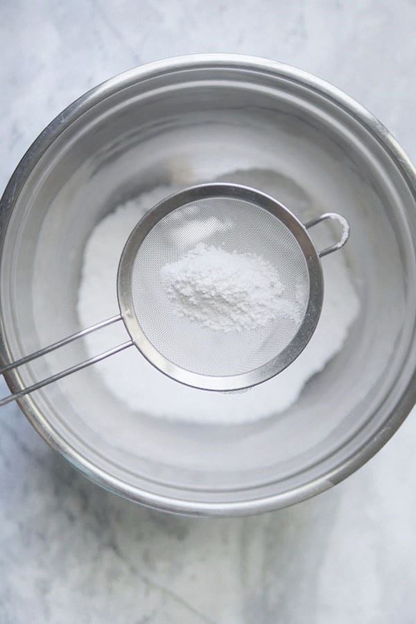 Sifted flour inside a bowl.