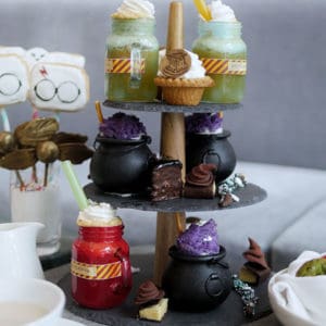 Harry Potter inspired afternoon tea treats on a 3-tier display.