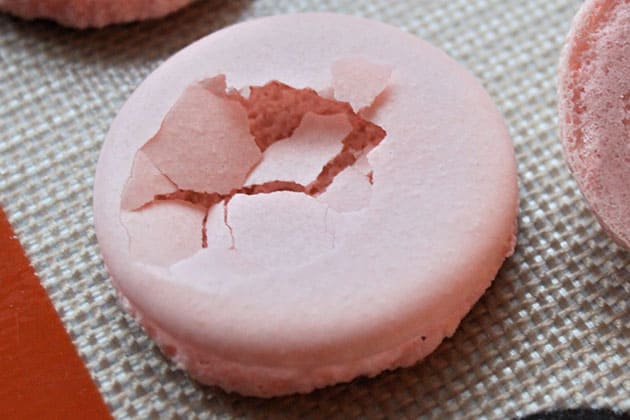 Macarons with large cracks.