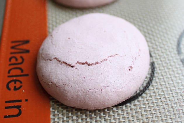 Macarons with cracked shells. 