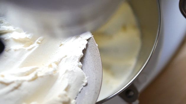 Cream cheese being added into batter. 