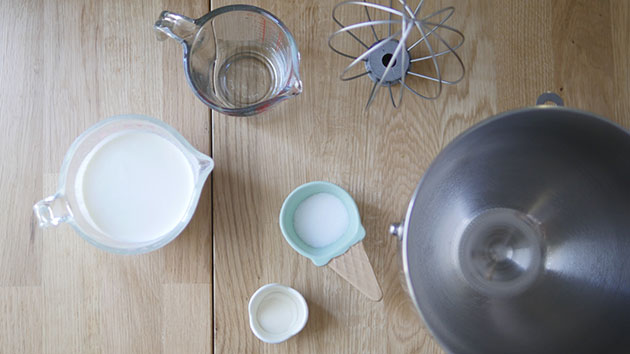 Ingredients and tools laid out to make stabilzied whipped cream.