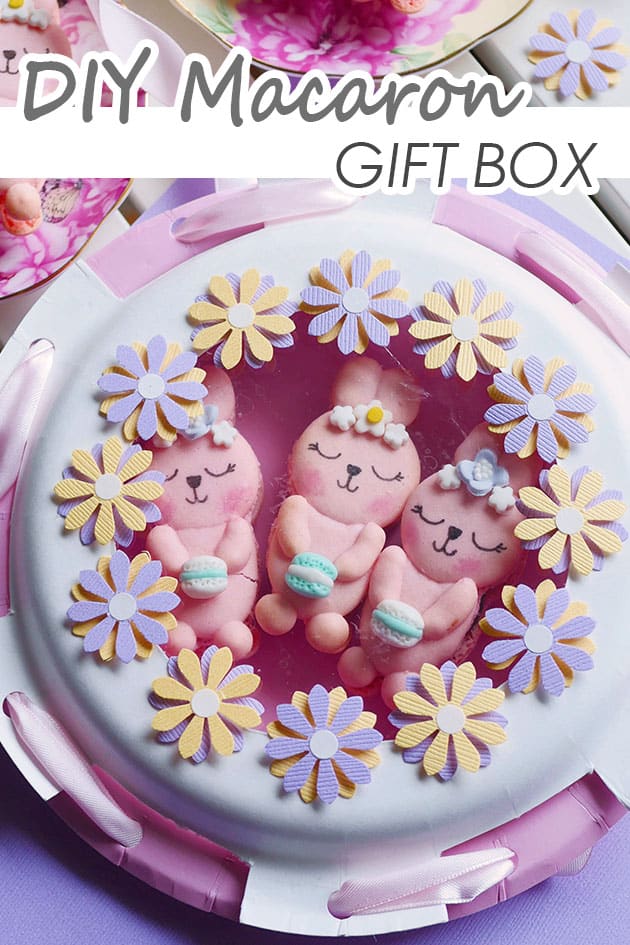 Bunny macarons in a DIY gift box adorned with flowers. 
