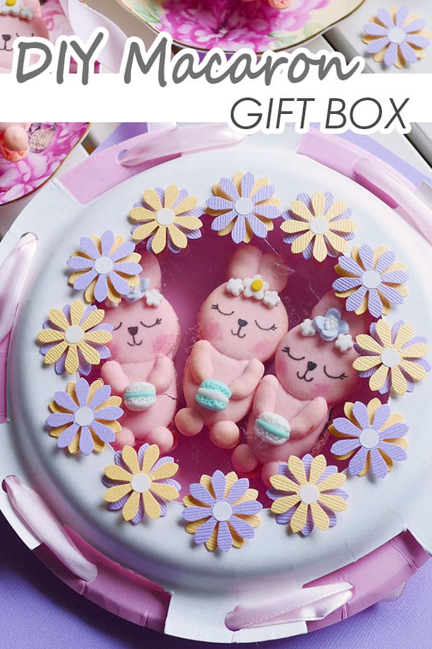 Bunny macarons in a DIY gift box adorned with flowers. 