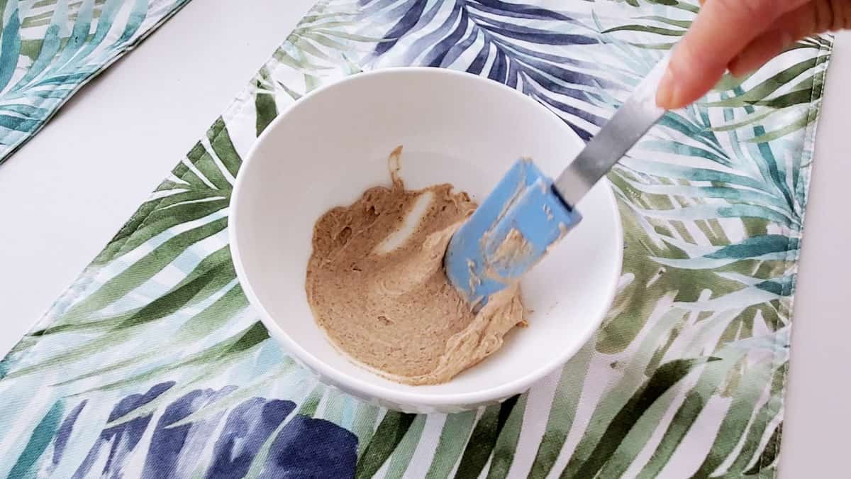 Mini spatula blending the filling. 