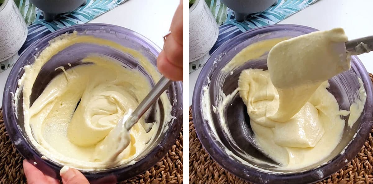 Macaron batter being folded inside a bowl. 