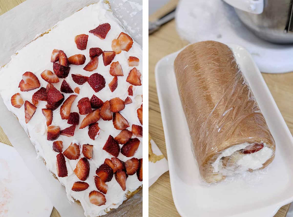 Cut up strawberries spread out evenly on a bed of cream on an unrolled cake roll and the cake wrapped up with plastic wrap on a dish.