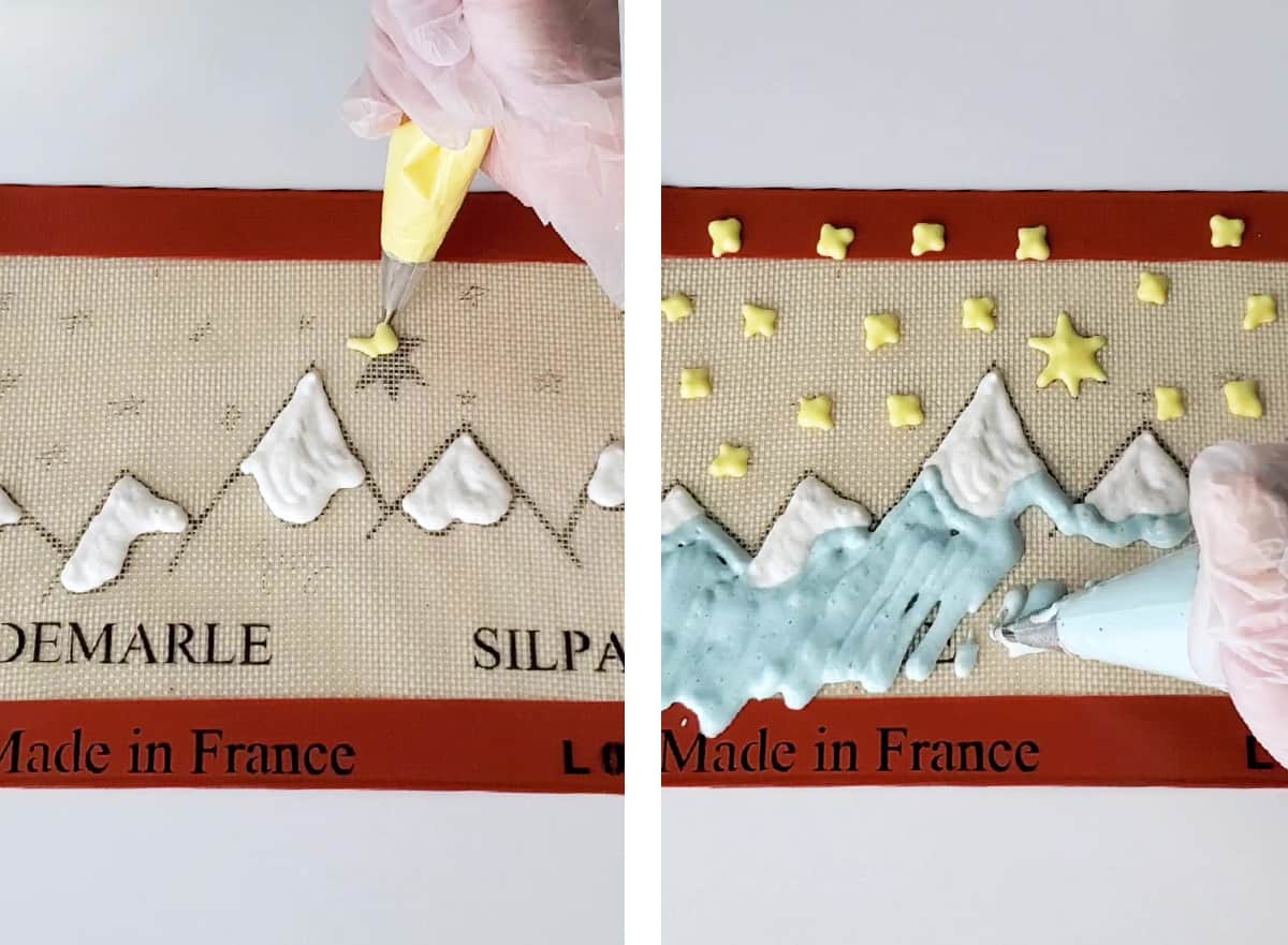A hand is piping pattern paste onto a silicone mat in the design of mountains and North star. 