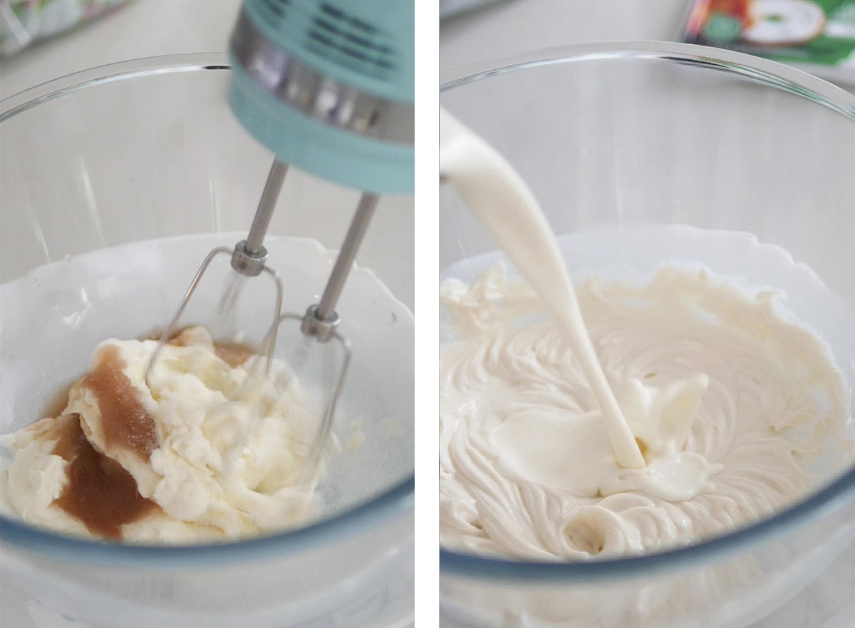 A mixer beating cream cheese with vanilla extract, sour cream and sugar. Whipped cream being poured into the mixture. 