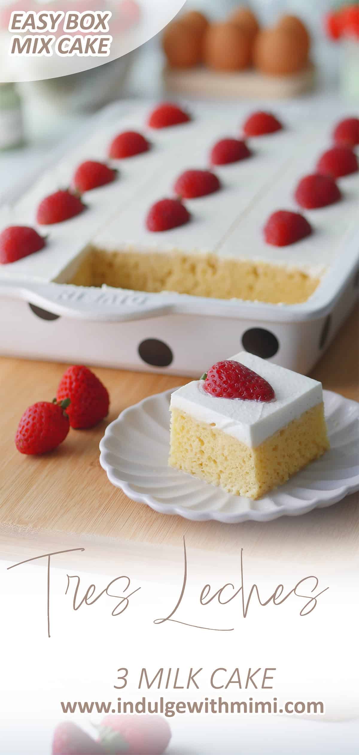 A flat baking pan filled with tres leches cake with two slices cut out showing the milk soak pooling on the bottom of the tray. 